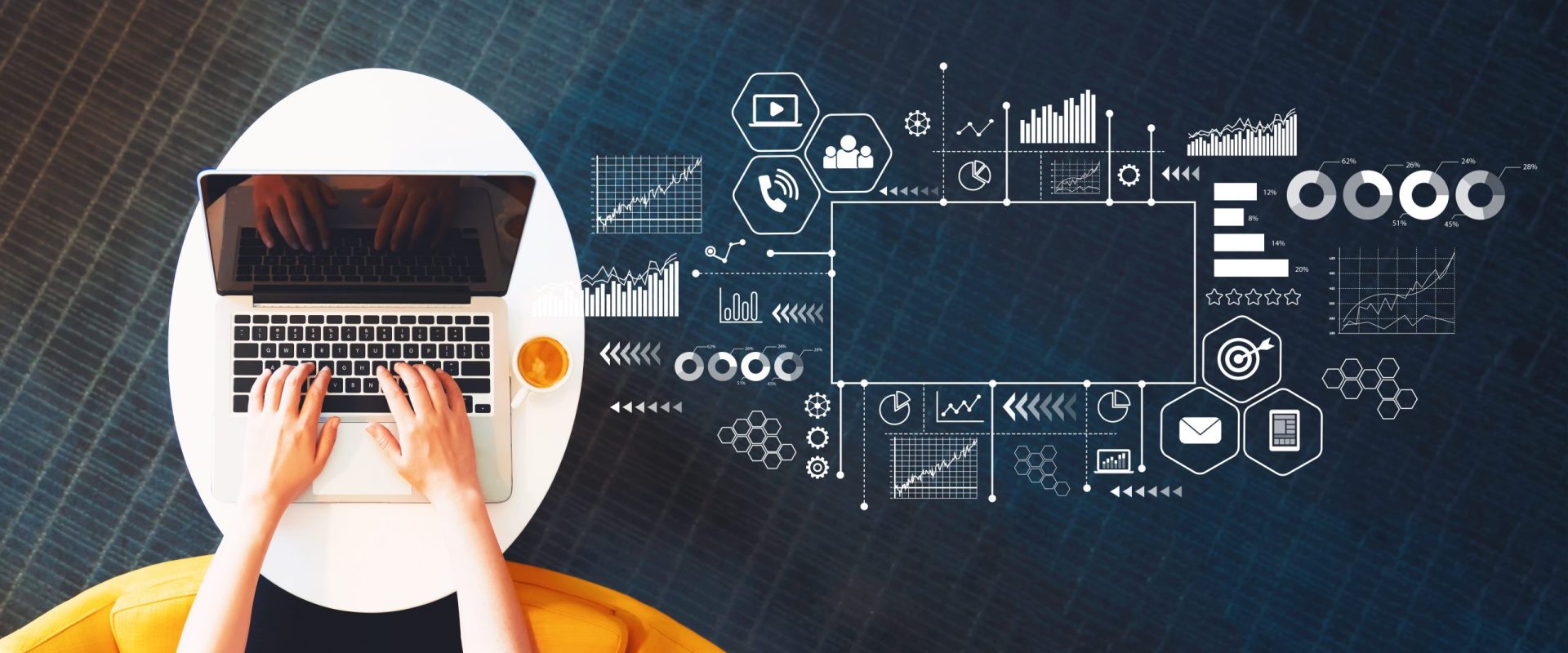 Marketing concept with person using a laptop on a white table